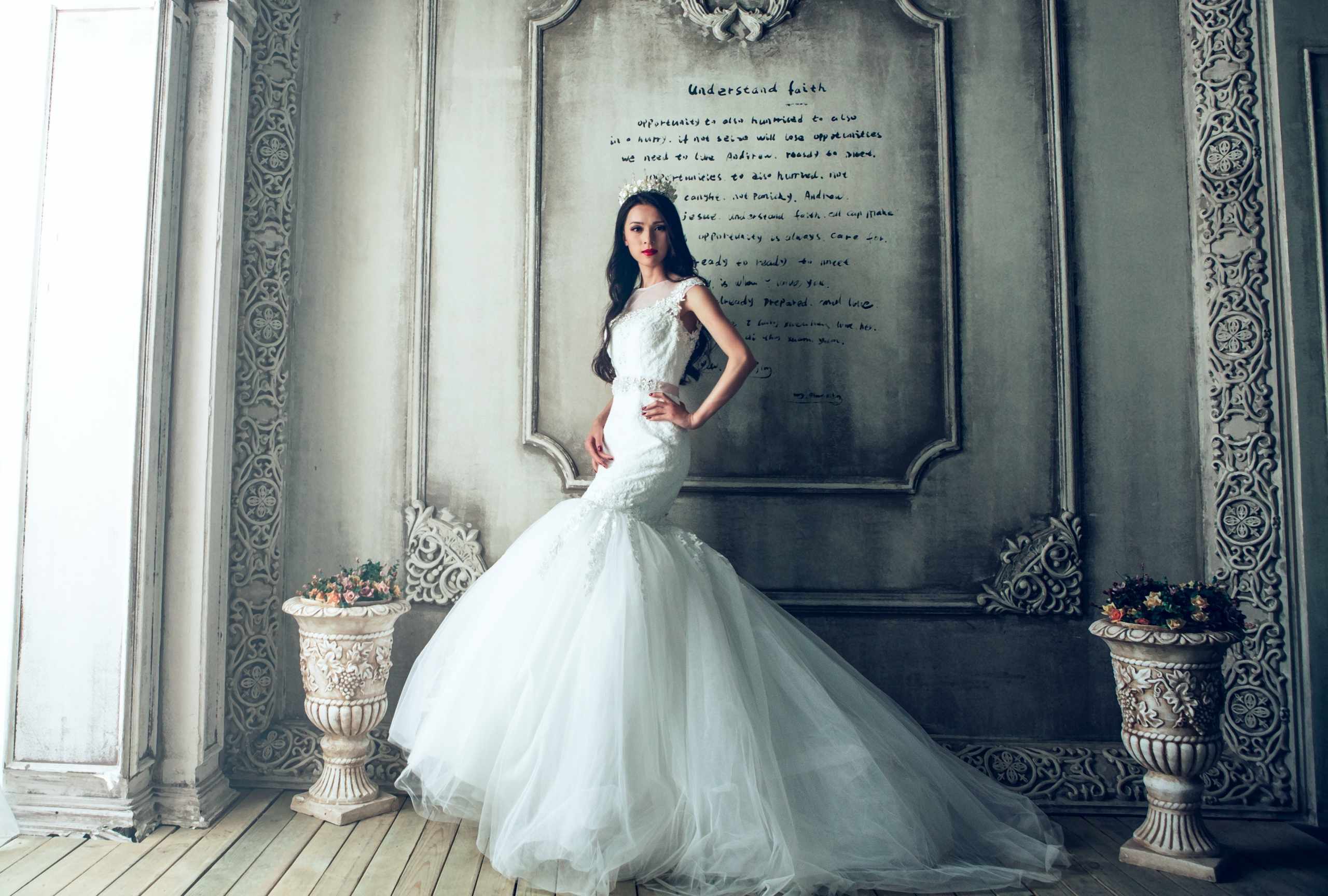 A Woman Posing in a Wedding Dress